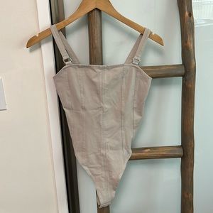Tan bodysuit with straps